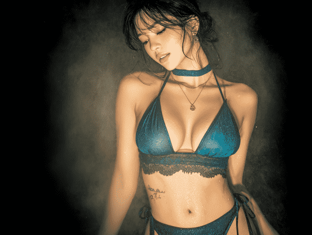 KL Chinese escort in Blue dress posing in KL hotel room